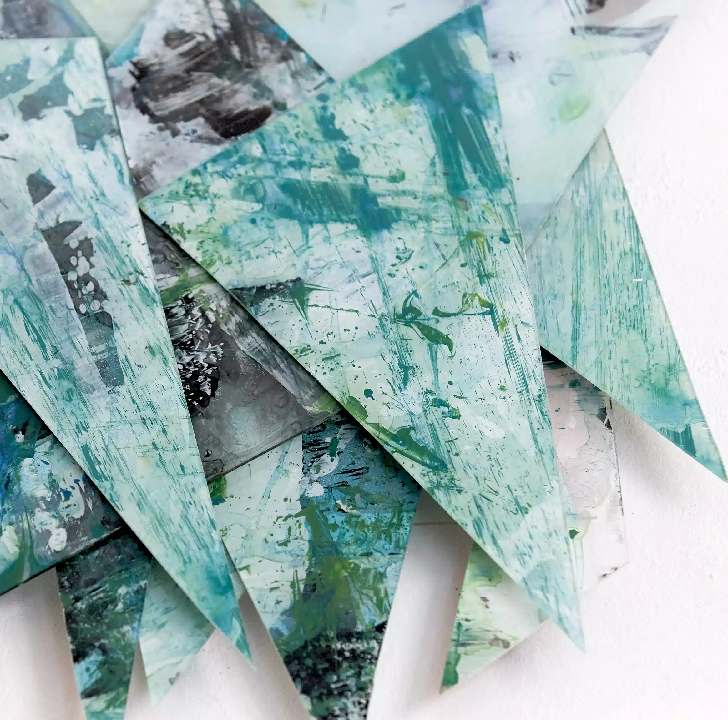 Hand painted acrylic on plexiglass sculpture by Marina Aristotel, Titled "Parts of the same you". Features irregular organic edges and layered translucent volumes. Vibrant green shades. Premium dimensional wall art for modern luxury interior and boutique hotels.
