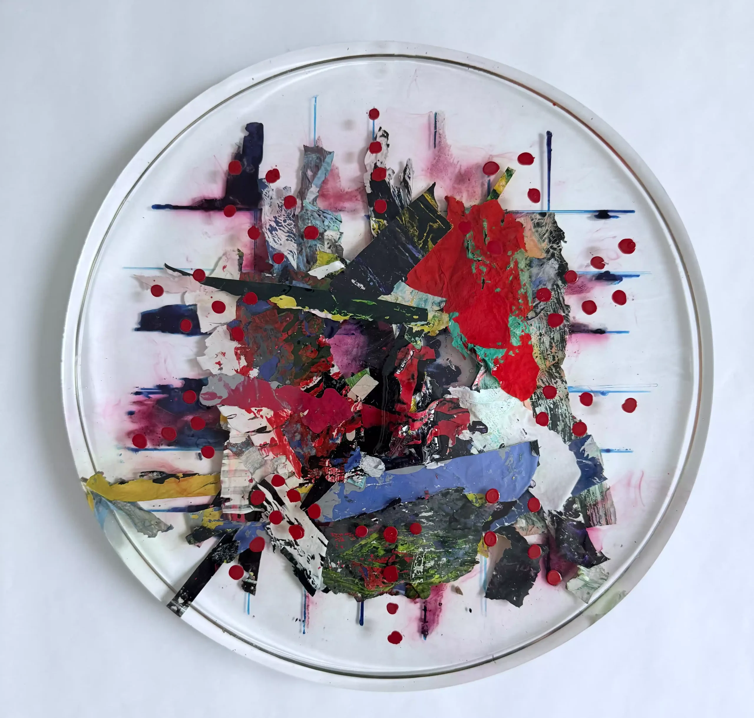 Original round abstract mixed media painting, 'From A colour to You' by Marina Aristotel. This contemporary structural resin artwork features a high-relief tactile surface with a vibrant red backdrop, layered with blue, black highlights, and sculptur like textures. The composition incorporates complex organic striations and distressed grid patterns, ideal for modern luxury interiors and collectors of expressive, textured fine art.